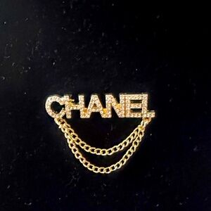 CHANEL  Brooch crystals with Chains signed in the back
